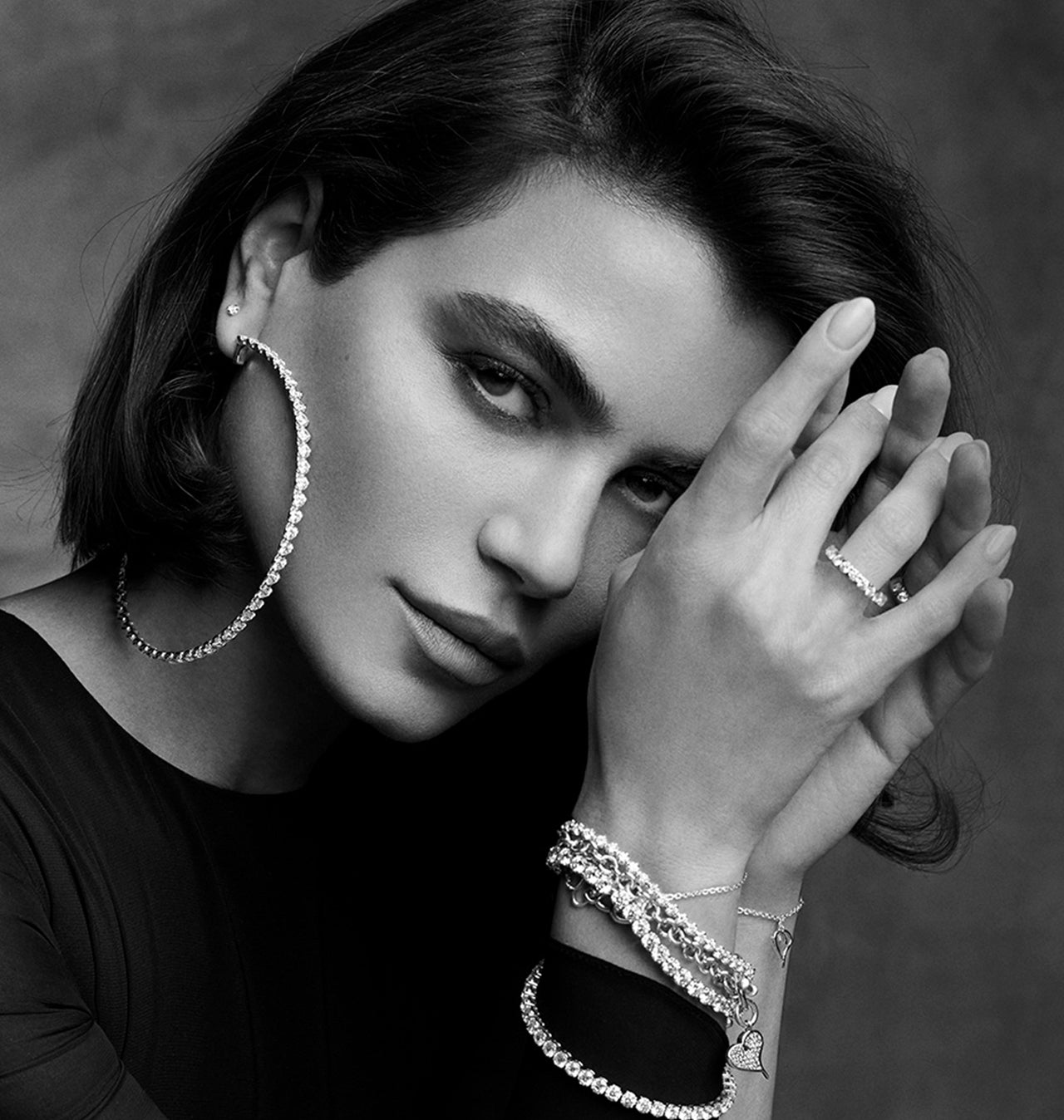 Female model wearing Jevar diamond jewelry